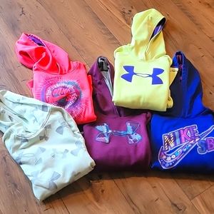 Bundle of Youth Medium Under Armour and Nike Hoodies.